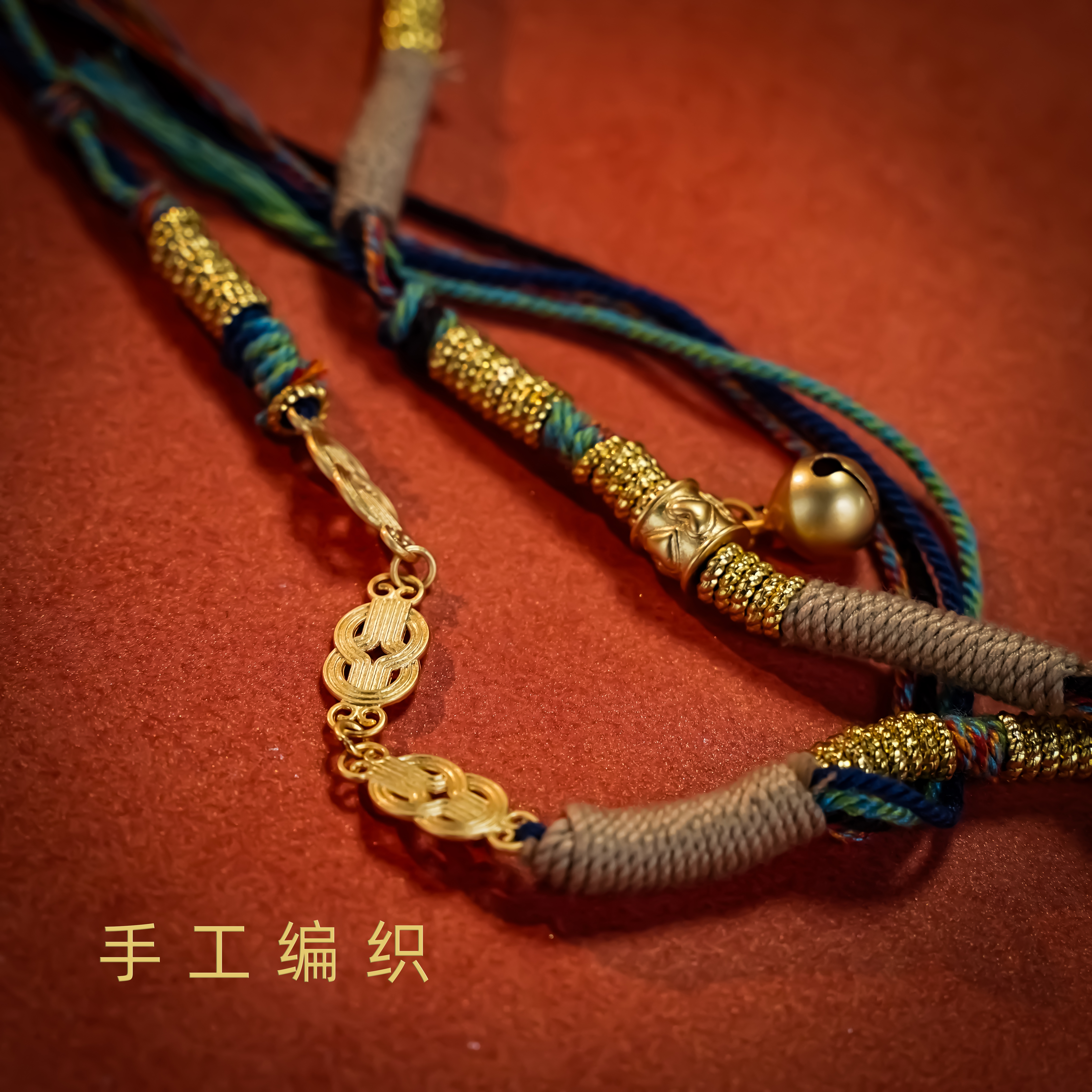 Miniature hand-painted thangka inside a gold frame