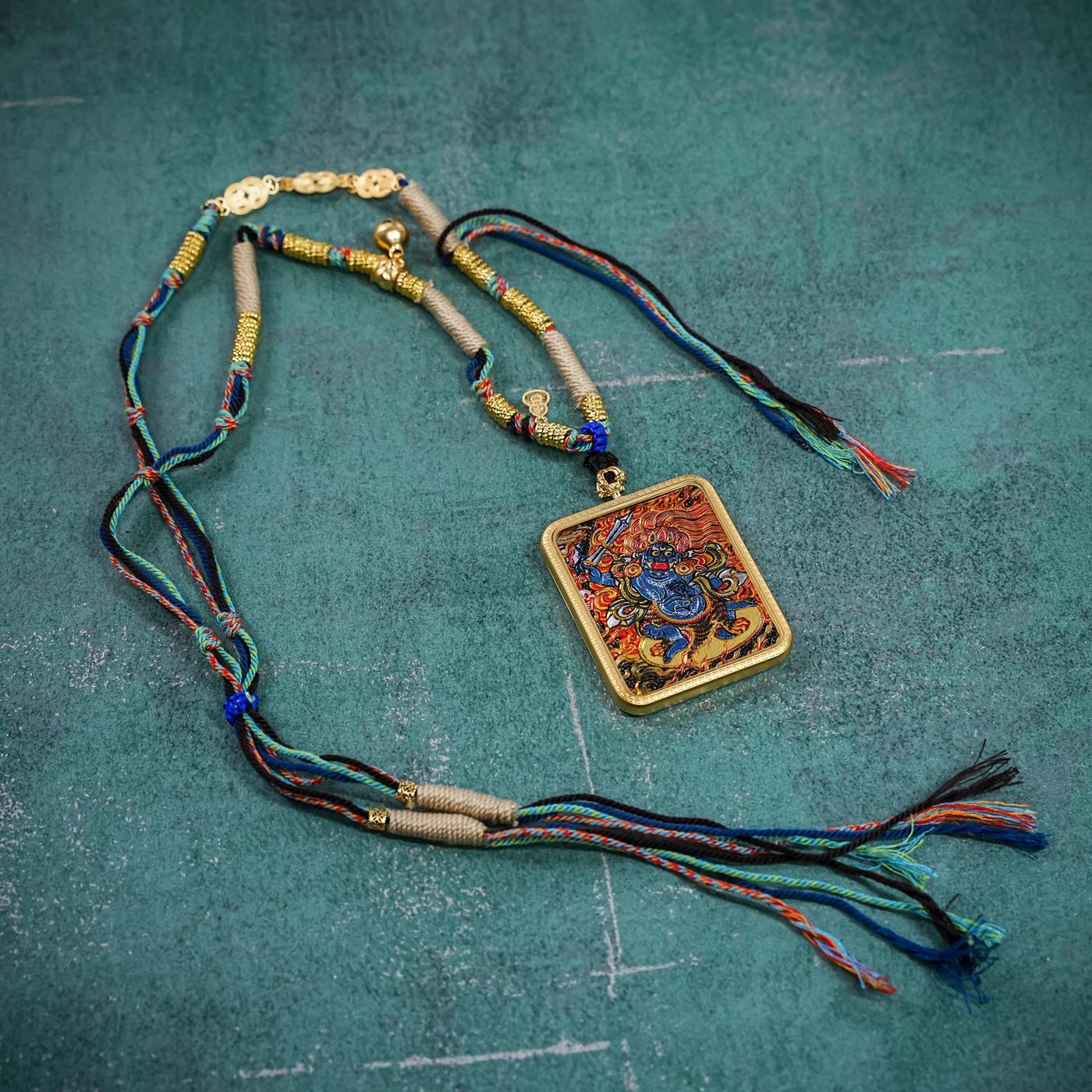 Vajrapāṇi thangka gau pendant, wrathful protector holding the vajra
